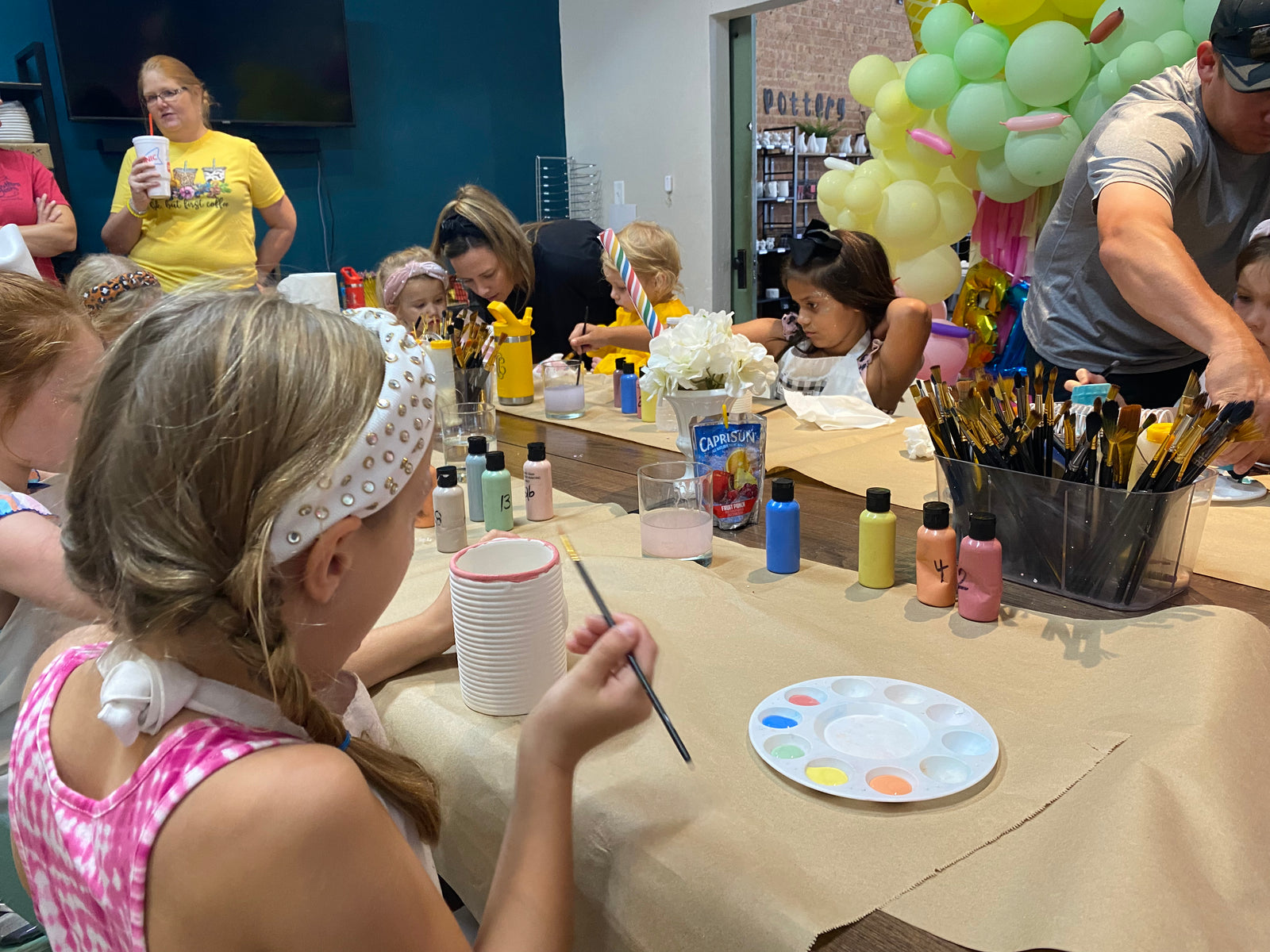 kids celebrating in the event room at downtown crafting in mineral wells texas
